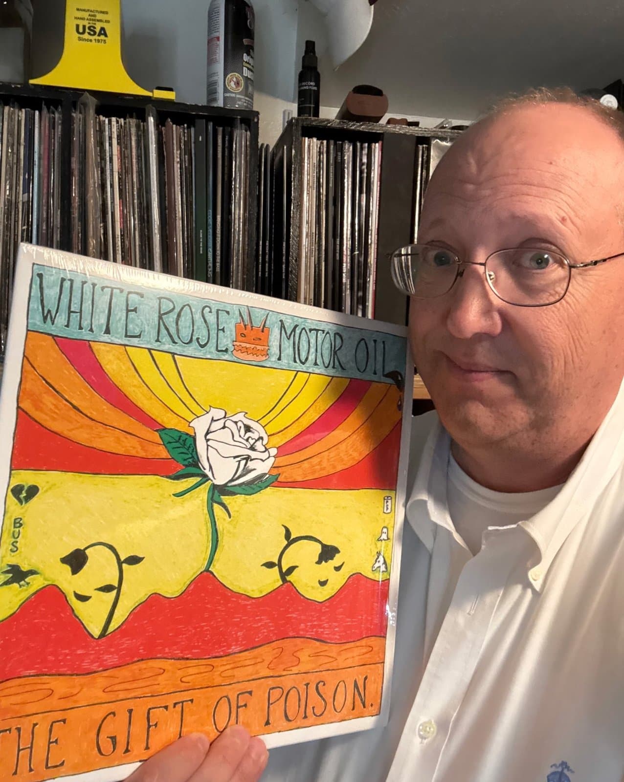 Orin Levy holding a vinyl record